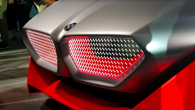 Illustration for article titled The 600 Horsepower BMW Vision M NEXT is BMW's Idea of a Hybrid Driver's Car of the Future